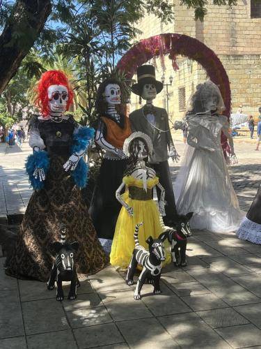 paper mache family of skeletons in the street